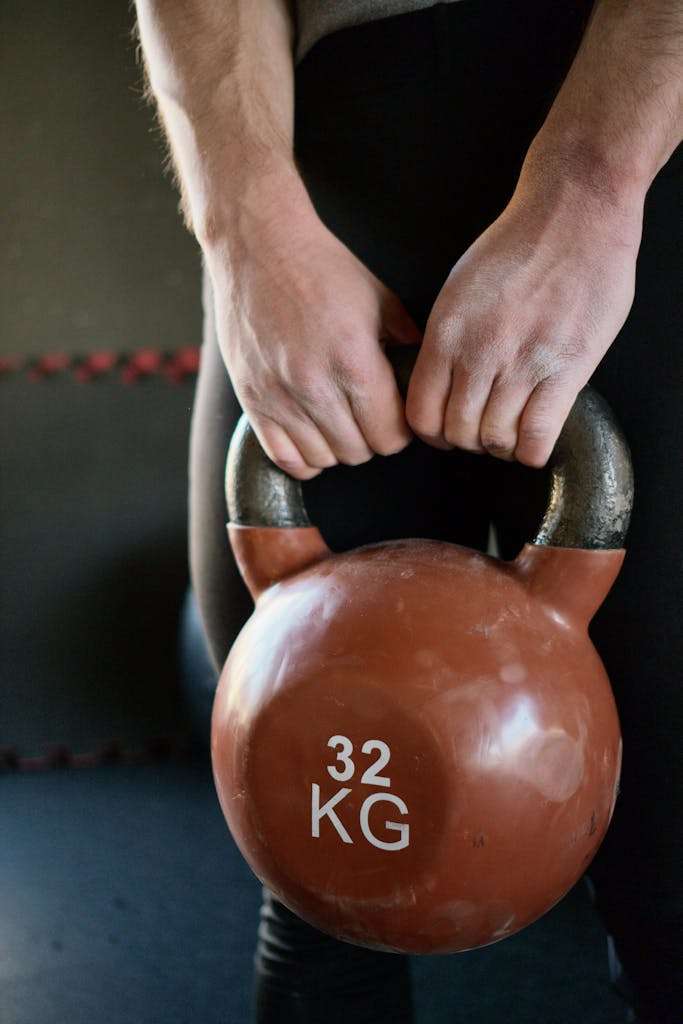 Person Holding a Kettlebell