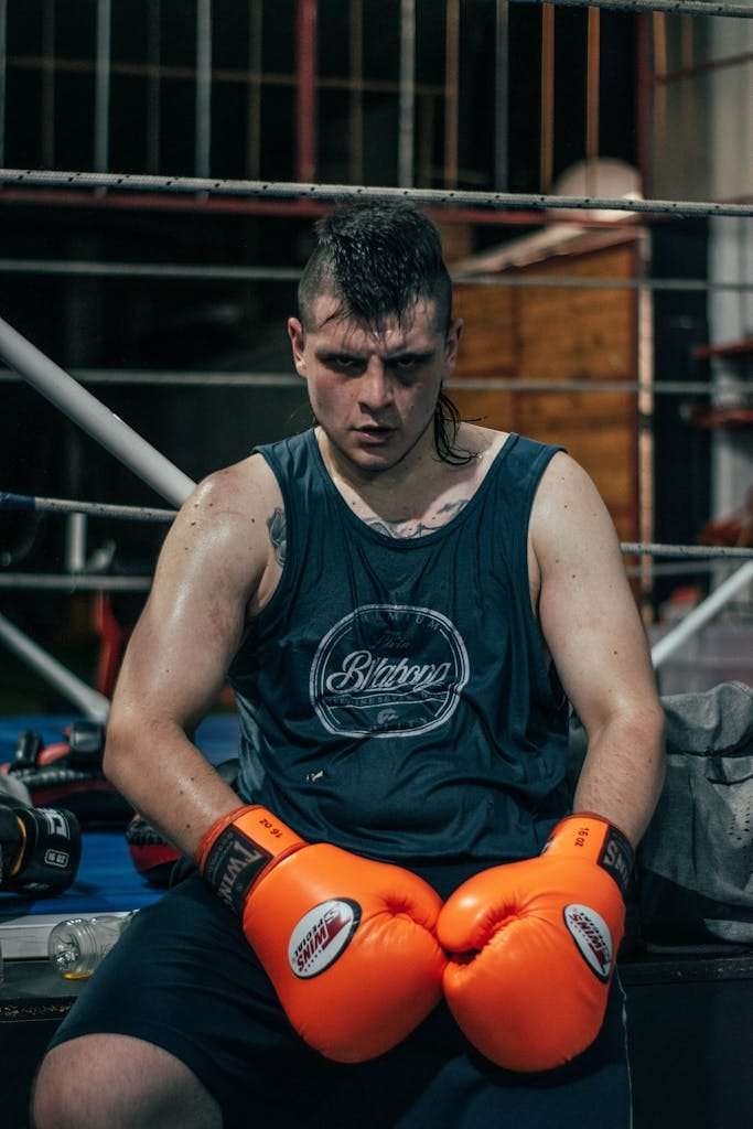Tired Man in Boxing Gloves